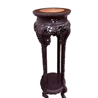 Sale Photo Thumbnail #33: Chinese export-style carved rosewood plant stand featuring an inset marble top, intricate openwork floral and grape motifs, and a lower tier shelf.