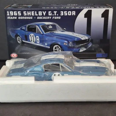 Acme 1:18 scale diecast model of a blue and white 1965 Shelby G.T. 350R Mark Donohue - Dockery Ford race car, new in box with original...
