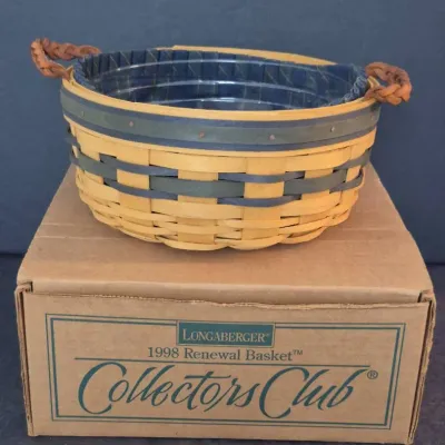 Longaberger 1998 Renewal Basket from the Collectors Club, featuring blue and green woven accents, leather handles, a plastic liner, and...