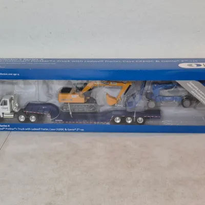 1:32 Die Cast Metal Intnl. ProStar + Truck with Ledwell Trailer, Case CX210C & Genie Z-135 - In Original Box