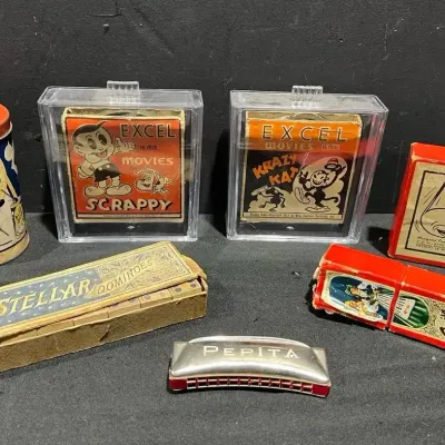 Krazy Kat & Scrappy Excel 16 mm Movies, Stellar Dominoes, Pepita German Harmonica, Alee-Oop Game Tin