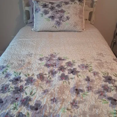 Twin Bed With Coordinated Floral Bedding (1 of 2) 