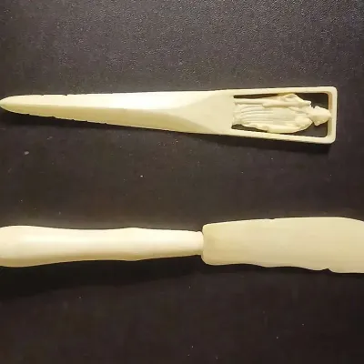 Vintage Ivory-Tone Plastic Utensil Pair with Figural Handle Detail