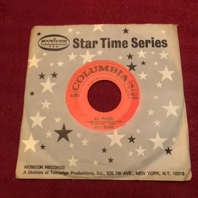 Marty Robbins – “El Paso” / “Running Gun” – Columbia 4-41511, 45 RPM