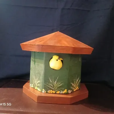 Decorative Wooden Birdhouse with Yellow Bird