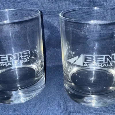 Pair of Ben’s Asphalt Inc. Logo Rocks / Whiskey Glasses – Heavy Clear Glass