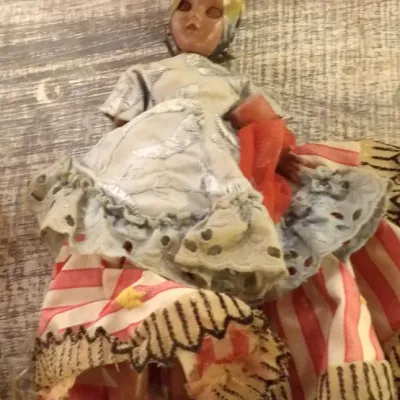 Sale Photo Thumbnail #53: Vintage Brazilian Carmen Miranda souvenir doll, featuring a traditional colorful dress, headpiece with fruit, and showing some wear consistent with age.