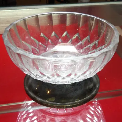 Sale Photo Thumbnail #12: Waterford crystal bowl featuring a classic diamond and wedge cut pattern, mounted on a tarnished silver-plated pedestal base.