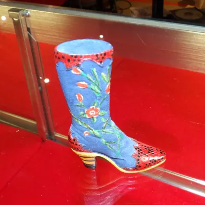 Sale Photo Thumbnail #32: Just the Right Shoe "Blue Bonnet" miniature collectible boot figurine by Raine, featuring hand-painted floral details and red snakeskin-textured accents.