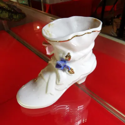 Sale Photo Thumbnail #33: Vintage Lefton porcelain high-top shoe figurine, featuring delicate applied blue and pink flowers with gold-trimmed accents.