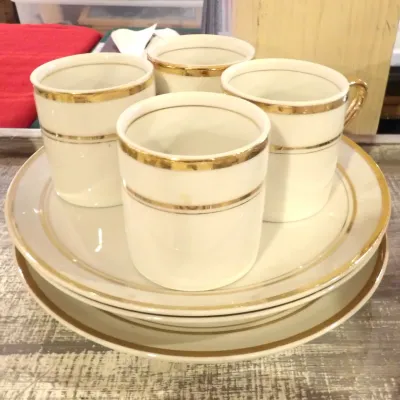 Sale Photo Thumbnail #44: Lenox ivory porcelain cups and saucers featuring elegant gold trim bands, in excellent vintage condition.