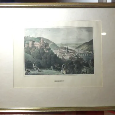 Sale Photo Thumbnail #10: Framed antique steel engraving of Heidelberg, Germany, featuring a hand-colored scenic view of the castle and river, presented in a gilded frame with a wide mat.