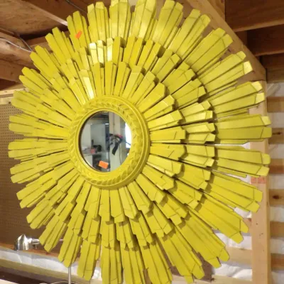 Sale Photo Thumbnail #41: Mid-century modern sunburst mirror, featuring a multi-layered starburst frame painted in a vibrant yellow finish.