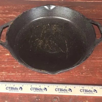 Sale Photo Thumbnail #25: Lodge Cast Iron Dual Handle Pan 11.5"