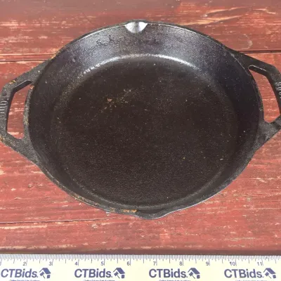 Sale Photo Thumbnail #27: Lodge 10" Cast Iron Dual Handle Skillet