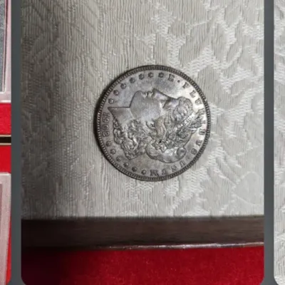 A 1902 Morgan silver dollar showing the obverse side with Liberty's profile, displaying moderate wear and natural toning.