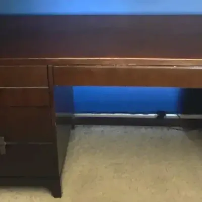 Dark Wood Desk With Brass-Toned Hardware