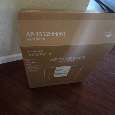 Sale Photo Thumbnail #85: Coway Airmega AP-1512HH(W) air purifier, new in its original cardboard packaging.