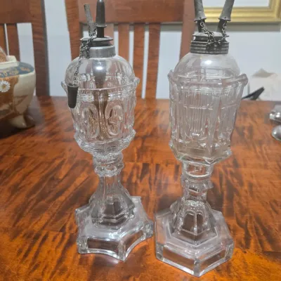 Pair of antique pressed glass whale oil lamps with double-tube burners and hexagonal bases, circa 19th century