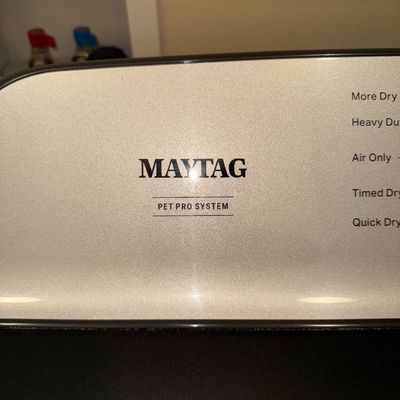 Sale Photo Thumbnail #9: Close-up of a Maytag Pet Pro System dryer control panel, showing a metallic silver finish and various drying cycle options.