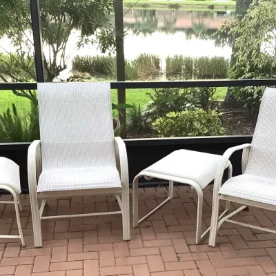 Pair Of Chairs With Ottomans 