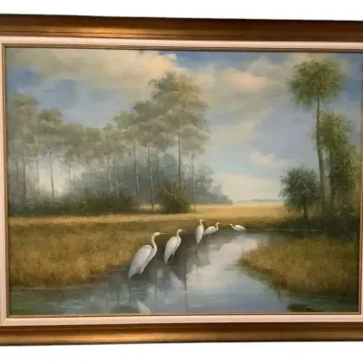 Egrets In A Pond