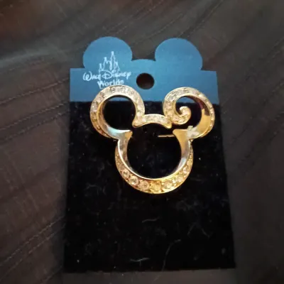 Gold-tone Rhinestone Mickey Mouse Brooch, mounted on its original Walt Disney World card.