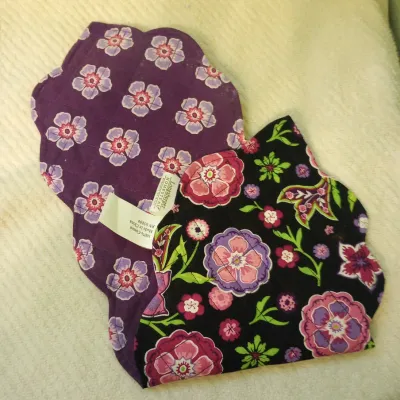 Sale Photo Thumbnail #18: Pair of Longaberger Homestead quilted floral cloth placemats with scalloped edges.