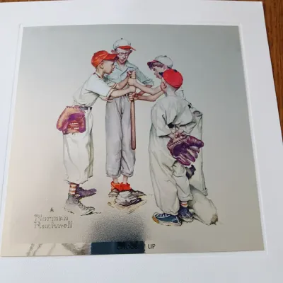 Sale Photo Thumbnail #70: Matted print of Norman Rockwell's "Choosin' Up" featuring young baseball players, presented in clean, display-ready condition.