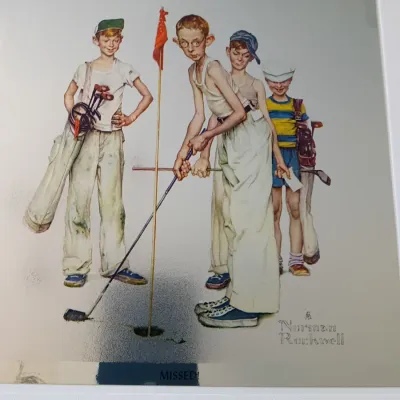 Sale Photo Thumbnail #69: Matted print of Norman Rockwell's "Missed!", featuring young golfers on a putting green.