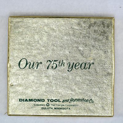 Sale Photo Thumbnail #158: Diamond Tool and Horseshoe Co. 75th Anniversary Paperweight