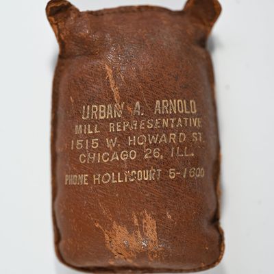 Sale Photo Thumbnail #163: Feed Sack Advertising Leather Paperweight