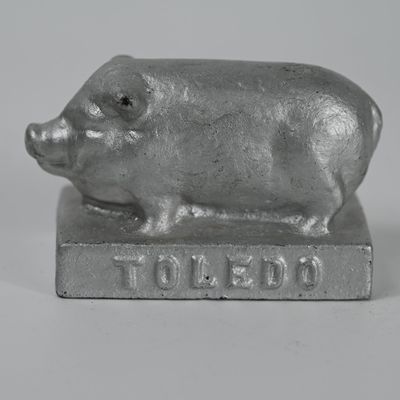 Sale Photo Thumbnail #194: Toledo Pig Iron Paperweight - Unknown Manufacturer