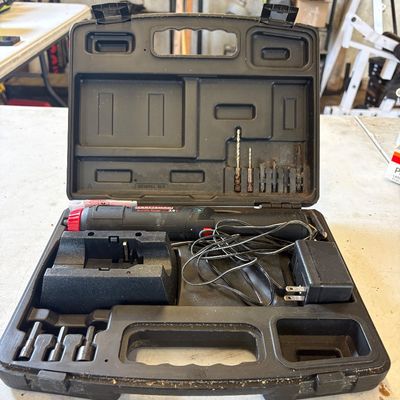 Sale Photo Thumbnail #44: Craftsman 3.6V cordless power screwdriver set with battery charger, drill bits, and driver attachments in a fitted blow-molded plastic carrying case.