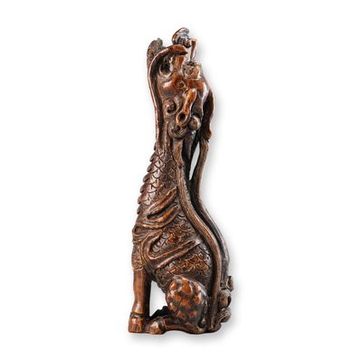 Sale Photo Thumbnail #375: Wood Netsuke of Kirin with Head Lifted Up