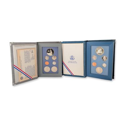Sale Photo Thumbnail #503: 2pc 1986, 1987 US Mint Prestige Proof Sets, 6 and 7 Coins