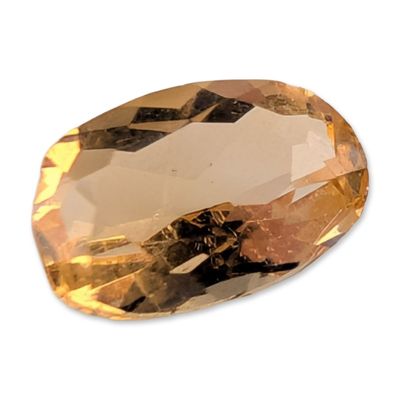 Sale Photo Thumbnail #428: Oval Honey-Yellow Faceted Gemstone
