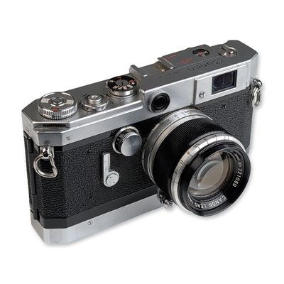Sale Photo Thumbnail #131: Canon Model VT de luxe 35mm Rangefinder Camera with 50mm f/1.8 Lens and Case