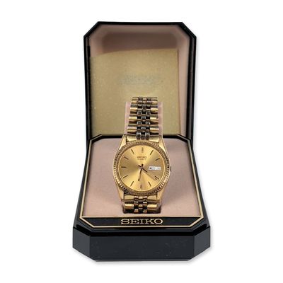 Sale Photo Thumbnail #394: Seiko Gold-Tone Quartz Day-Date Wristwatch