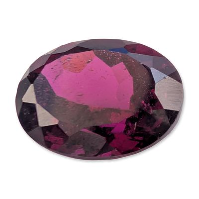 Sale Photo Thumbnail #655: Oval Faceted Purplish Pink Gemstone