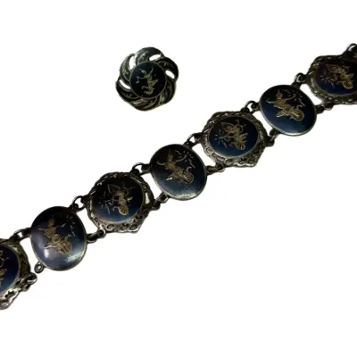 Sale Photo Thumbnail #6: Vintage Siam sterling silver and black enamel panel bracelet with matching ring, featuring traditional etched Thai dancer motifs.