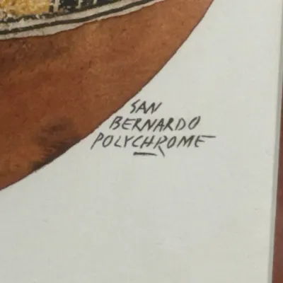 Sale Photo Thumbnail #480: Close-up detail of an artwork titled 'San Bernardo Polychrome,' featuring handwritten text alongside intricate pottery-style illustration.