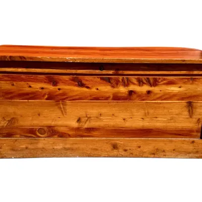 Sale Photo Thumbnail #20: Vintage solid pine storage chest featuring prominent wood grain and knots, showing light surface wear.