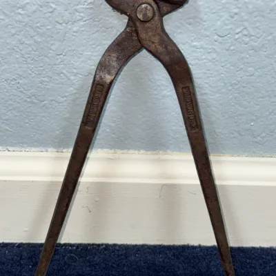 Sale Photo Thumbnail #577: Vintage Diamond brand steel hoof nippers or pincer tool with visible patina.
