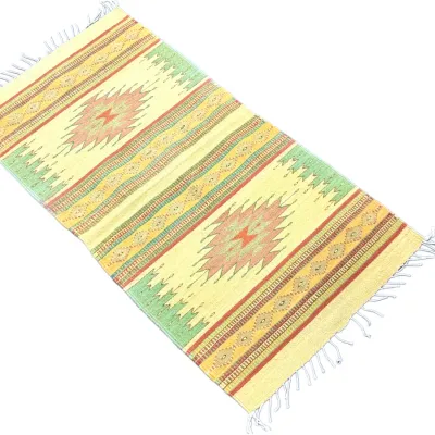 Sale Photo Thumbnail #31: Southwestern-style flatweave runner rug featuring central diamond motifs and geometric borders in shades of yellow, green, and terracotta with fringed edges.