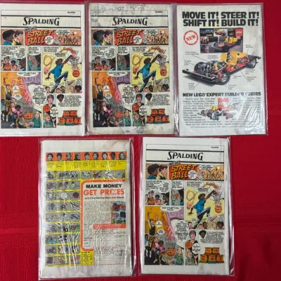 Sale Photo Thumbnail #795: Collection of five vintage comic books displayed in protective plastic sleeves showing rear-cover advertisements from the late 1970s.