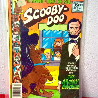 Sale Photo Thumbnail #768: Marvel Comics Group Hanna-Barbera's Scooby-Doo comic book issue #2, December 1977. The bagged comic shows light edge wear and a small price sticker on the cover.