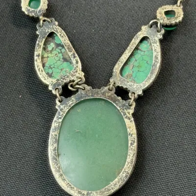 Sale Photo Thumbnail #329: Sajen sterling silver statement necklace featuring turquoise and green stone links, stamped Sajen and 925 on the reverse.