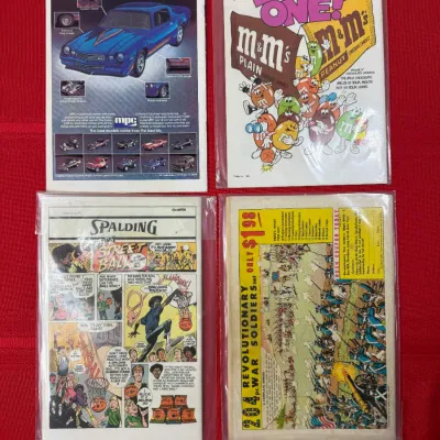 Sale Photo Thumbnail #791: Group of four vintage comic books displaying back cover advertisements, three of which are stored in protective plastic sleeves.