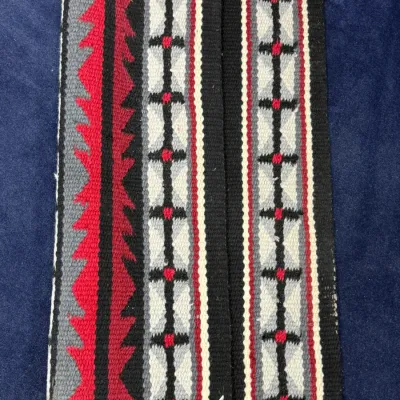 Sale Photo Thumbnail #441: Woven Southwestern wool saddle blanket featuring geometric patterns in red, grey, black, and cream.